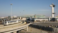 “International terminal, train, and control tower at New York’s Kennedy Airport”