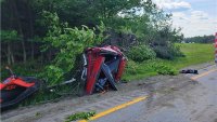 Pickup truck towing a trailer flips over in serious crash on Route 101 in Candia, NH