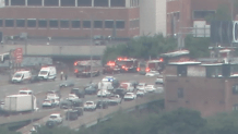 Boston fire trucks at the scene of a school bus fire on I-93 in Dorchester on Monday, June 17, 2024.