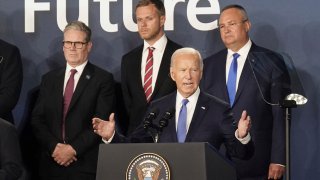 FILE - Britain's Prime Minister Keir Starmer, left, looks on as U.S. President Joe Biden speaks, where he introduced Ukrainian President Volodymyr Zelenskyy during an event on the Ukraine Compact at the NATO Summit at the Walter E. Washington Convention Center, in Washington, Thursday, July 11, 2024. Biden's withdrawal from the U.S. presidential race injects greater uncertainty into the world.