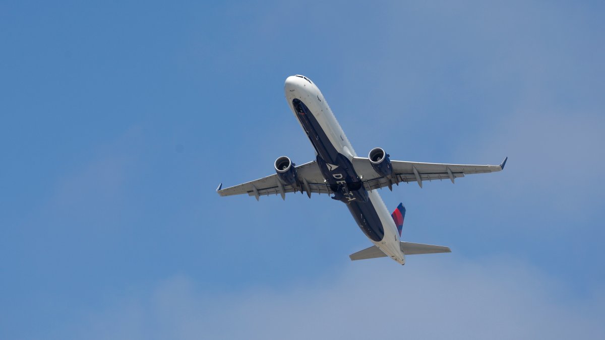 Delta flight diverts to JFK Airport over food poisoning fears NECN