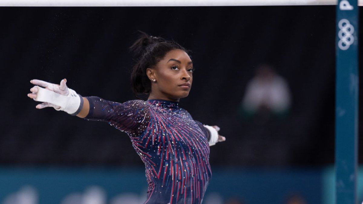 Simone Biles submits an original skill on uneven bars for 2024 Paris