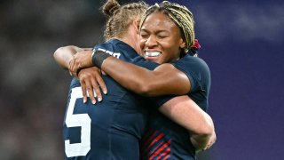 Ariana Ramsey hugs fellow U.S. rugby sevens player Alev Kelter.