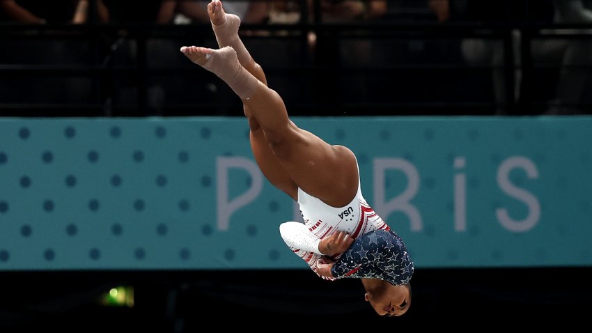 Simone Biles executes on vault during the Paris 2024 all-around final