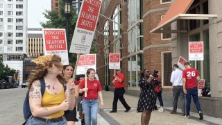 Workers at the Fidelity Investments-owned Seaport Hotel picketed in front of the hotel Tuesday morning and have announced a boycott calling for customers to avoid the destination until their union is recognized.