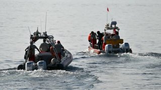 Divers of the Vigili del Fuoco, the Italian Corps. of Firefighters leave Porticello harbor near Palermo, to resume research for a last missing person on August 23, 2024, four days after the British-flagged luxury yacht Bayesian sank. 