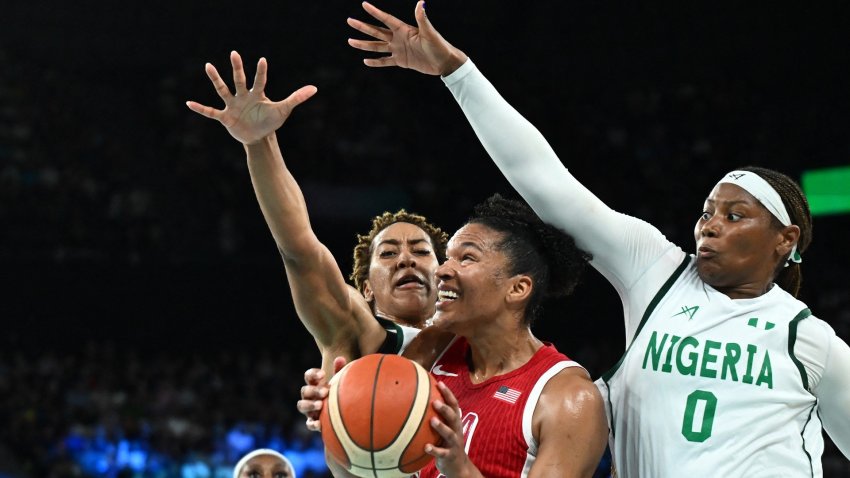 Alyssa Thomas drives for a layup against Nigeria