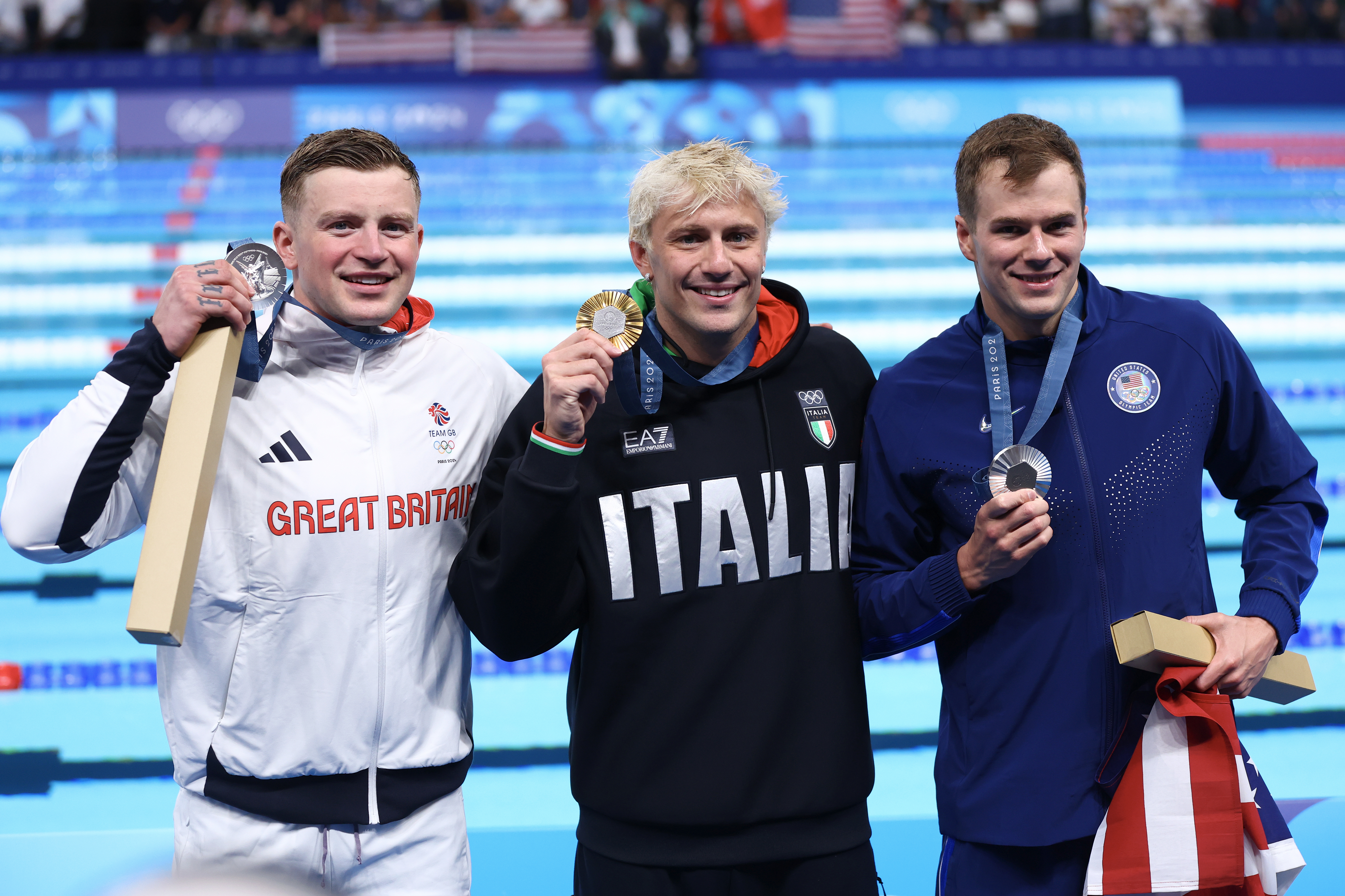 Gold Medalist Nicolo Martinenghi of Team Italy (C) and Silver Medalists Adam Peaty of Team Great Britain (L) and Nic Fink of Team USA