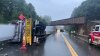 Tractor-trailer carrying windmill blade collides with railroad bridge in Maine