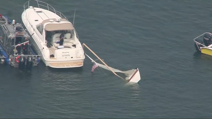 A submerged boat seen in the Hingham Harbor on Friday, Aug. 16, 2024.