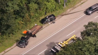 A crashed SUV on Interstate 495 in Hopkinton, Massachusetts, on Thursday, Aug. 22, 2024.