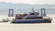 An MBTA ferry near where a whale was seen in Boston Harbor on Wednesday, Aug. 14, 2024.