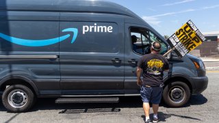 A group of Amazon delivery drivers hold a labor strike at the DAX7 Amazon Sortation Center in South Gate. The police became involved due to the hold up of Amazon vehicles. 