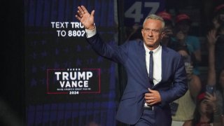 Former independent presidential candidate Robert F. Kennedy Jr. gestures during Republican presidential nominee and former President Donald Trump’s rally in Glendale, Arizona, Aug. 23, 2024.