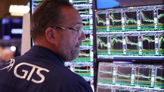 Traders work on the floor of the New York Stock Exchange during morning trading on September 04, 2024 in New York City. 