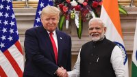 India’s Prime Minister Narendra Modi shakes hands with former U.S. President Donald Trump before a meeting at Hyderabad House in New Delhi on February 25, 2020.