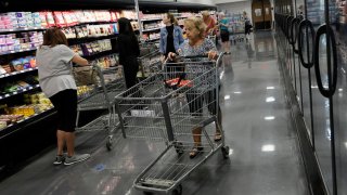 Shoppers are shown at Kosher grocer KC Market’s newest location in Boynton Beach, Florida, on Wednesday, April 10, 2024.