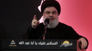 FILE PHOTO: Lebanon’s Hezbollah leader Sayyed Hassan Nasrallah addresses his supporters during a public appearance at a religious procession, one day before the Shi’ites will mark the day of Ashura, in Beirut’s southern suburbs, Lebanon October 11, 2016. 