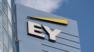 FILE - Ernst & Young signage is being pictured on a building in Warsaw, Poland, on July 8, 2024.