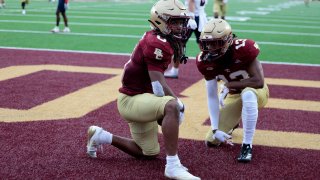 CHESTNUT HILL, MA – SEPTEMBER 07: Boston College Eagles running back Treshaun Ward (0)  celebrates his core with wide receiver Dino Tomlin (13) during a game between the Boston College Eagles and the Duquesne Dukes on September 7, 2024, at Alumni Stadium in Chestnut Hill, Massachusetts. (Photo by Fred Kfoury III/Icon Sportswire via Getty Images)