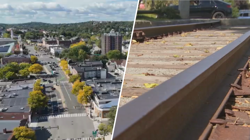 The town of Arlington, seen from above at left, and a historic stretch of rail preserved in the town.