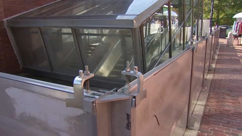 A deployable flood barrier erected around the Aquarium MBTA Blue Line stop in Boston on Friday, Sept. 27, 2024.