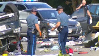 Massachusetts State Police at the scene of a deadly car crash in New Bedford, Massachusetts, on Friday, Sept. 6, 2024.