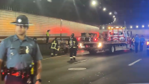 First responders in the O'Neill Tunnel in Boston after a fire briefly shut I-93 north on Wednesday, Sept. 11, 2024.