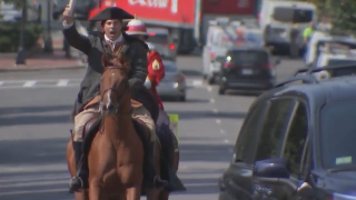 A Paul Revere reenactor riding through Boston on Tuesday, Sept. 17, 2024, as part of a previous of the Massachusetts 250 events.