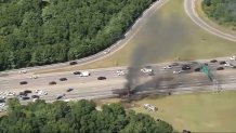 Smoke rising from a truck fire on I-93 in Canton, Massachusetts, on Tuesday, Sept. 3, 2024.