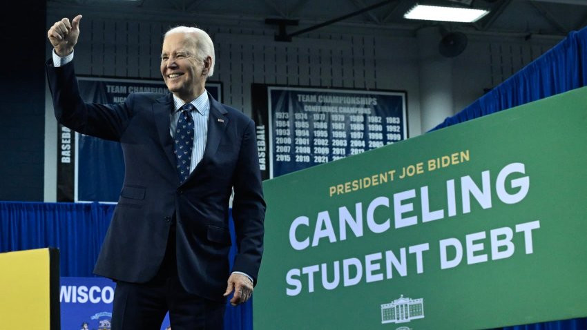 US President Joe Biden gestures after speaking about student loan debt relief at Madison Area Technical College in Madison, Wisconsin, April 8, 2024. 