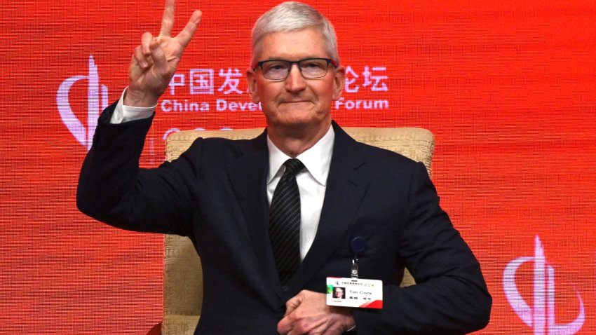 Apple’s Chief Executive Officer Tim Cook gestures during the China Development Forum in Beijing on March 24, 2024. 