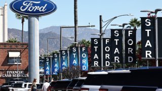 Ford and Lincoln vehicles are displayed for sale at a Ford dealership on August 21, 2024 in Glendale, California. 