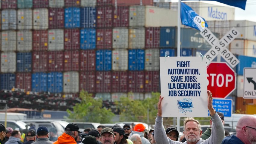 Shipping containers are stacked as dockworkers are on strike in Port Newark on October 1, 2024 in New Jersey. 