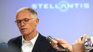 Carlos Tavares, chief executive officer of Stellantis NV, speaks to the media at the Stellantis auto manufacturing plant in Sochaux, France, on Thursday, Oct. 3, 2024. 