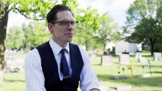 Victor M. Sweeney in a cemetery in Warren, Minnesota.