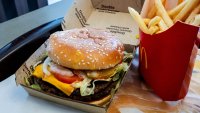 A double quarter pounder with cheese and fries arranged at a McDonald’s restaurant in El Sobrante, California, US, on Wednesday, Oct. 23, 2024. 