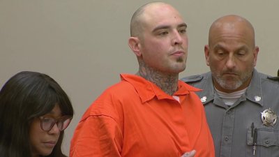 Man accused of stabbing Woodbury police officer appears in court