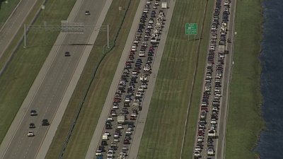 Traffic on I-75 at Glades Parkway as people try to go back west after Milton