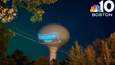 Town responds to Trump sign projected on Hanson water tower