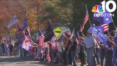 Hanson rally draws large crowd in support of Trump, resident behind light projection on water tower