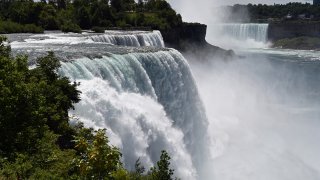 File - Water flowing over Niagara Falls in New York, on Aug. 13, 2022.