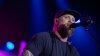 Country singer Brantley Gilbert pauses concert to help wife give birth in tour bus, then returns to finish show