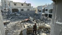 A Palestinian inspects the damage after an overnight Israeli airstrike in Beit Lahia the northern Gaza Strip on October 27, 2024 amid the ongoing war in the Palestinian territory between Israel and Hamas.