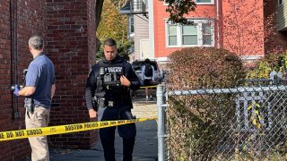 Investigators on scene at a stabbing on Humboldt Avenue in Boston’s Roxbury neighborhood on Oct. 31, 2024.