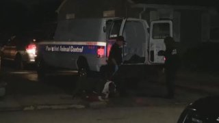 Pawtucket Animal Control outside a home on Don Court in Pawtucket, Rhode Island.