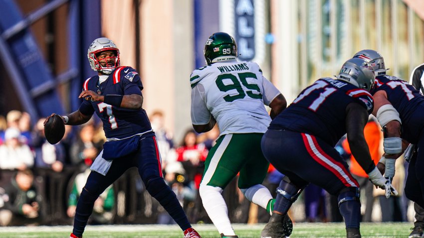 Oct 27, 2024; Foxborough, Massachusetts, USA; New England Patriots quarterback Jacoby Brissett (7) throws a pass against the New York Jets in the second half  at Gillette Stadium. Mandatory Credit: David Butler II-Imagn Images