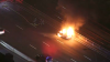 Flames erupt from burning van on Mass. Pike in Boston