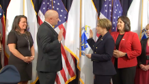 Massachusetts Gov. Maura Healey swears in Geoffrey Noble as colonel of the Massachusetts State Police.