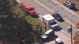 First responders gathered near a police investigation in Nashua, New Hampshire, on Wednesday, Oct. 23, 2024.